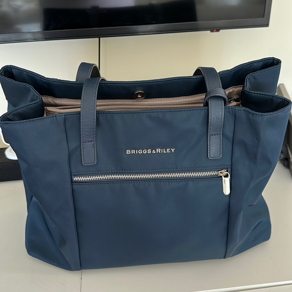Briggs & Riley travel tote/  computer bag. Never used.